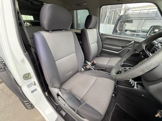 ジムニー ＸＧ　６型　５ＭＴ　車検２年付　猪狩バンパー　リフトアップ　ブリスターフェンダー　ナンバー移設キット　社外マフラー　社外１６インチＡＷ　社外エアクリ　社外ステアリング　社外テール　社外ラテラル　防錆塗装済（31枚目）