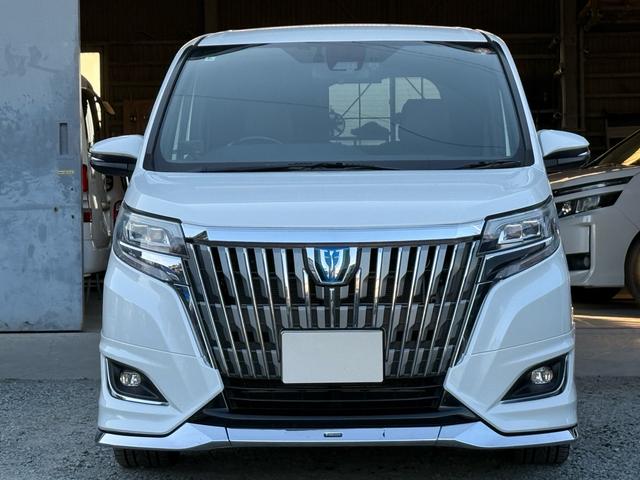 エスクァイア ハイブリッドＧｉ　後期型　モデリスタフルエアロ　モデリスタリアスポイラー　ＲＡＹＳ１８インチＡＷ　純正１０インチナビ　純正１２．８インチフリップダウンモニター　社外スモークテール　社外ＬＥＤリフレクター　黒革シート（2枚目）