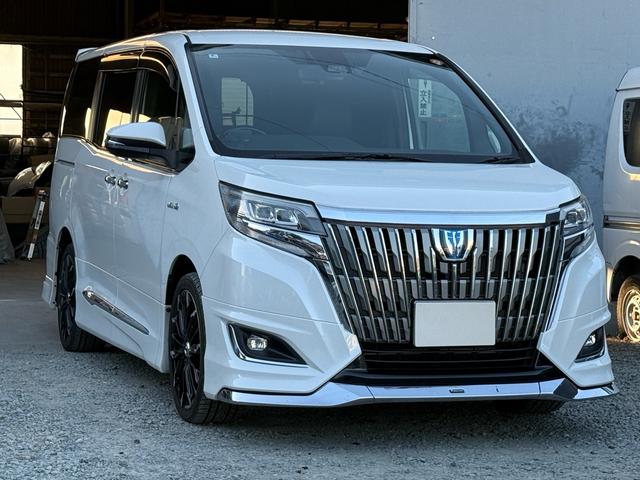 エスクァイア ハイブリッドＧｉ　後期型　モデリスタフルエアロ　モデリスタリアスポイラー　ＲＡＹＳ１８インチＡＷ　純正１０インチナビ　純正１２．８インチフリップダウンモニター　社外スモークテール　社外ＬＥＤリフレクター　黒革シート（9枚目）