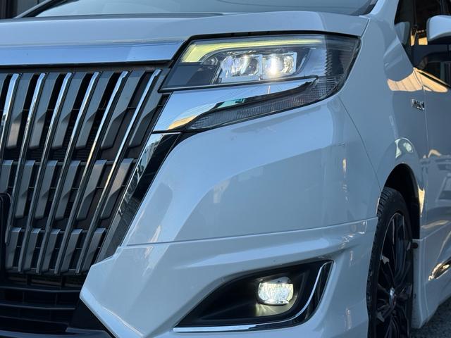 エスクァイア ハイブリッドＧｉ　後期型　モデリスタフルエアロ　モデリスタリアスポイラー　ＲＡＹＳ１８インチＡＷ　純正１０インチナビ　純正１２．８インチフリップダウンモニター　社外スモークテール　社外ＬＥＤリフレクター　黒革シート（57枚目）