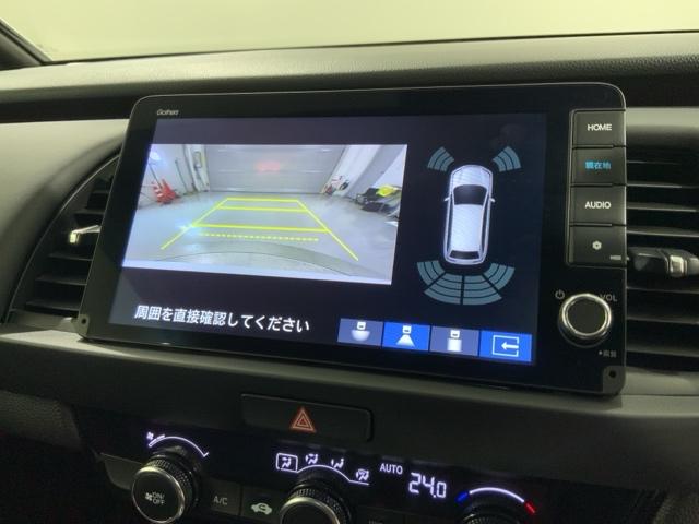 フィット e:HEVホーム H SENSING 新車保証 試乗車 ワンオ-ナ- ナビLXM-242ZFNI TV Rカメラ BTオ-ディオ ETC LEDライト VSA クルコン スマ-トキ- スペアキ-盗難防止装置 整備記録簿(7枚目)