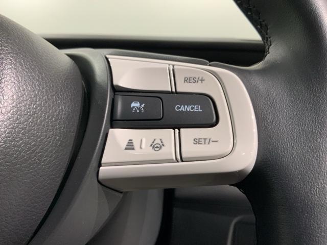 フィット e:HEVホーム H SENSING 新車保証 試乗車 ワンオ-ナ- ナビLXM-242ZFNI TV Rカメラ BTオ-ディオ ETC LEDライト VSA クルコン スマ-トキ- スペアキ-盗難防止装置 整備記録簿(12枚目)