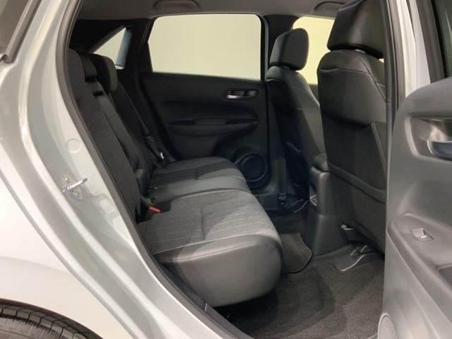 フィット e:HEVホーム H SENSING 新車保証 試乗車 ワンオ-ナ- ナビLXM-242ZFNI TV Rカメラ BTオ-ディオ ETC LEDライト VSA クルコン スマ-トキ- スペアキ-盗難防止装置 整備記録簿(18枚目)