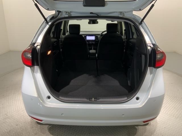 フィット e:HEVホーム H SENSING 新車保証 試乗車 ワンオ-ナ- ナビLXM-242ZFNI TV Rカメラ BTオ-ディオ ETC LEDライト VSA クルコン スマ-トキ- スペアキ-盗難防止装置 整備記録簿(19枚目)