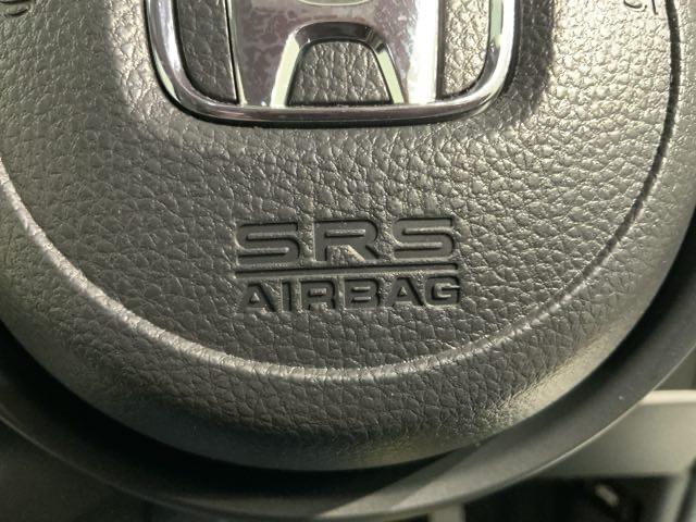 フィット e:HEVホーム H SENSING 新車保証 試乗車 ワンオ-ナ- ナビLXM-242ZFNI TV Rカメラ BTオ-ディオ ETC LEDライト VSA クルコン スマ-トキ- スペアキ-盗難防止装置 整備記録簿(22枚目)