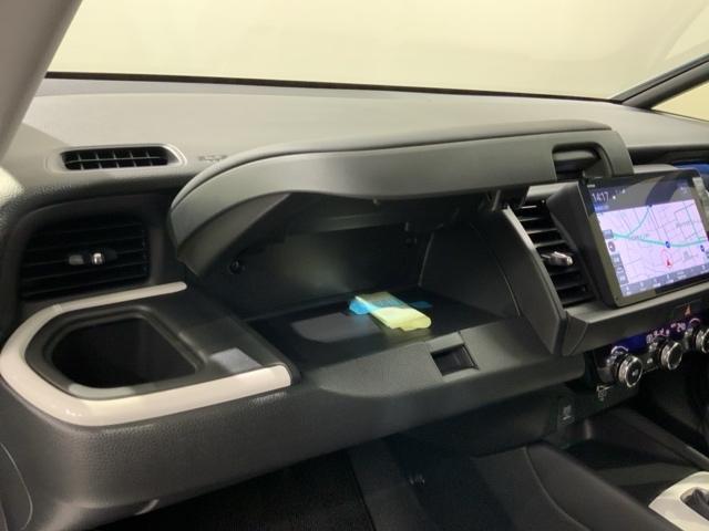 フィット e:HEVホーム H SENSING 新車保証 試乗車 ワンオ-ナ- ナビLXM-242ZFNI TV Rカメラ BTオ-ディオ ETC LEDライト VSA クルコン スマ-トキ- スペアキ-盗難防止装置 整備記録簿(26枚目)