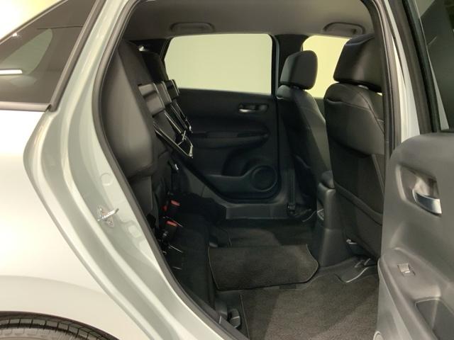 フィット e:HEVホーム H SENSING 新車保証 試乗車 ワンオ-ナ- ナビLXM-242ZFNI TV Rカメラ BTオ-ディオ ETC LEDライト VSA クルコン スマ-トキ- スペアキ-盗難防止装置 整備記録簿(34枚目)