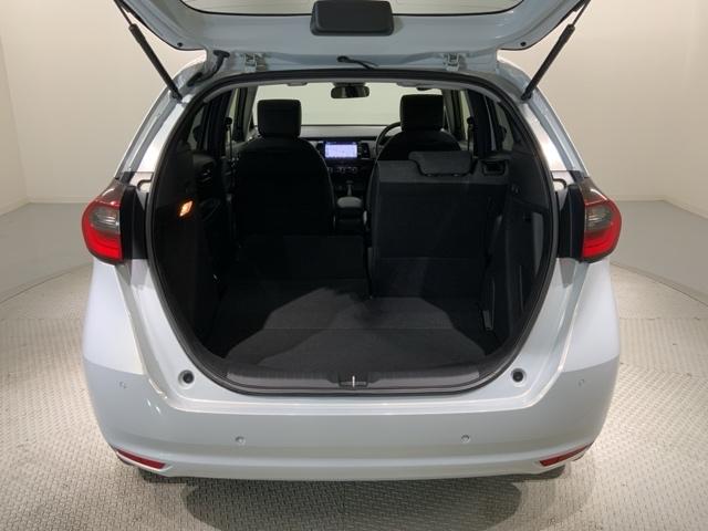 フィット e:HEVホーム H SENSING 新車保証 試乗車 ワンオ-ナ- ナビLXM-242ZFNI TV Rカメラ BTオ-ディオ ETC LEDライト VSA クルコン スマ-トキ- スペアキ-盗難防止装置 整備記録簿(39枚目)