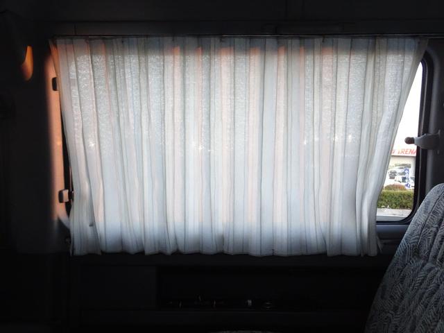 デリカスターワゴン アクティブワールド　ウインタースペシャル　Ｐ３５Ｗ　５ＭＴ　４ＷＤ　８人乗り　ベンチシート　３ナンバー　ディーゼルターボ　４Ｄ５６エンジン　寒冷地仕様車　グリルガード／フォグランプ／カーテン　ダブルエアコン　スターワゴン　デリカ（61枚目）