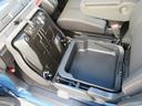 助手席を跳ね上げると深くて広いラゲッジバスケット！手提げ付で持ち運びもできます！