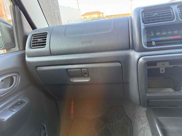 ジムニー ランドベンチャー　４ＷＤ　キーレスエントリー　電動格納ミラー　ＭＴ　ＡＢＳ　アルミホイール　衝突安全ボディ　エアコン　パワーウィンドウ（21枚目）