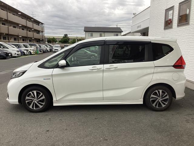 フリードハイブリッド ハイブリッド・ＥＸ　ワンオーナー／禁煙車／ホンダ純正９インチナビ／ＥＴＣ／両側電動スライドドア　１オナ　地デジフルセグＴＶ　シ－トヒ－タ－　整備記録簿　リヤカメラ　ＬＥＤライト　フルオートエアコン　ＡＢＳ　ＤＶＤ再生可（5枚目）
