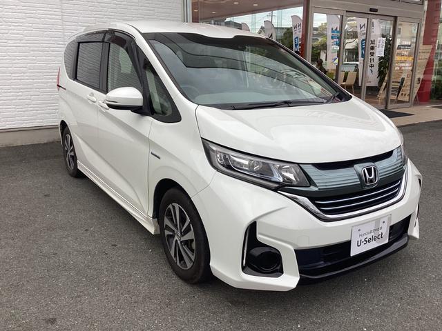 フリードハイブリッド ハイブリッド・ＥＸ　ワンオーナー／禁煙車／ホンダ純正９インチナビ／ＥＴＣ／両側電動スライドドア　１オナ　地デジフルセグＴＶ　シ－トヒ－タ－　整備記録簿　リヤカメラ　ＬＥＤライト　フルオートエアコン　ＡＢＳ　ＤＶＤ再生可（6枚目）