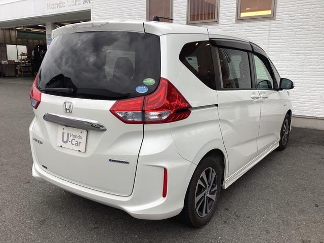 フリードハイブリッド ハイブリッド・ＥＸ　ワンオーナー／禁煙車／ホンダ純正９インチナビ／ＥＴＣ／両側電動スライドドア　１オナ　地デジフルセグＴＶ　シ－トヒ－タ－　整備記録簿　リヤカメラ　ＬＥＤライト　フルオートエアコン　ＡＢＳ　ＤＶＤ再生可（8枚目）