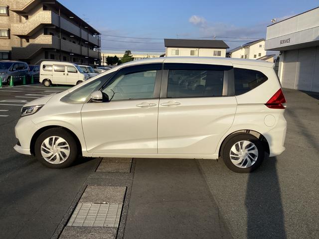 フリード Ｇ　当店試乗車・ホンダセンシング・純正ナビゲーション・ＥＴＣ・ドライブレコーダー・両側電動スライドドア　Ａクルーズ　記録簿　３列シート　カーテンエアバック　ＬＥＤヘッドライト　パワーウインドウ　地デジ（5枚目）
