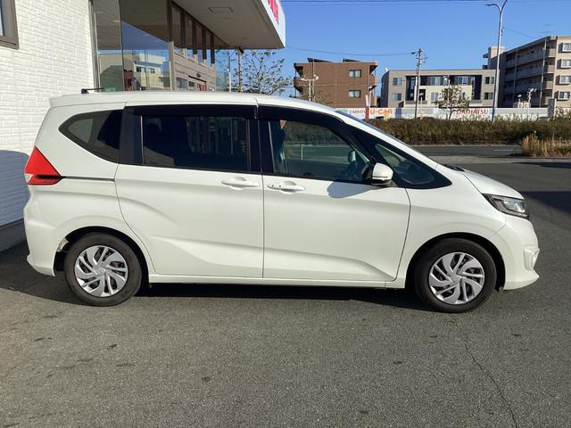 フリード Ｇ・ホンダセンシング　ワンオーナー／禁煙車／ホンダ純正７インチフルセグナビ／ＥＴＣ　Ｆセグ　Ｗエアバッグ　パワーウィンドウ　１オ－ナ－　アクティブクルーズコントロール　スマートキ　整備点検記録簿　ＶＳＡ　エアコン　キーレス（4枚目）