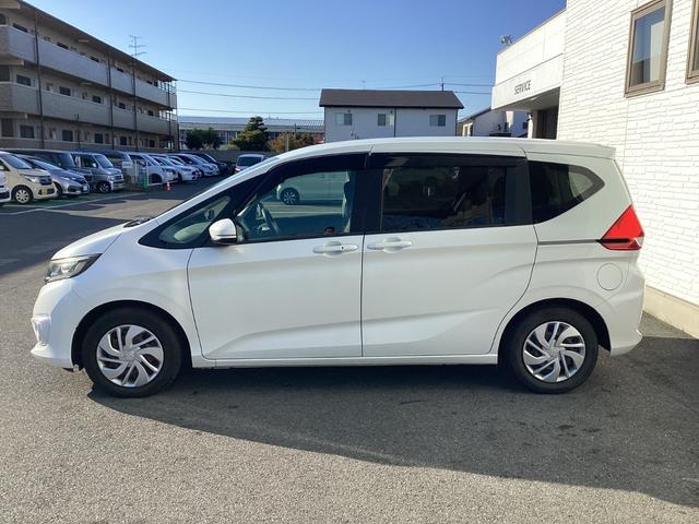 フリード Ｇ・ホンダセンシング　ワンオーナー／禁煙車／ホンダ純正７インチフルセグナビ／ＥＴＣ　Ｆセグ　Ｗエアバッグ　パワーウィンドウ　１オ－ナ－　アクティブクルーズコントロール　スマートキ　整備点検記録簿　ＶＳＡ　エアコン　キーレス（5枚目）