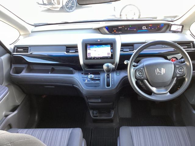 フリード Ｇ・ホンダセンシング　ワンオーナー／禁煙車／ホンダ純正７インチフルセグナビ／ＥＴＣ　Ｆセグ　Ｗエアバッグ　パワーウィンドウ　１オ－ナ－　アクティブクルーズコントロール　スマートキ　整備点検記録簿　ＶＳＡ　エアコン　キーレス（18枚目）