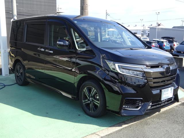 ステップワゴンスパーダ e:HEVスパーダG・EXホンダセンシング 1オーナー 禁煙車 純正メモリナビ 純正ドラレコ前後 天吊りモニター マルチビューカメラ ETC2.0 エアバック 地デジ クルコン サイドエアバッグ シ-トヒ-タ- 衝突軽減システム スマキー(9枚目)