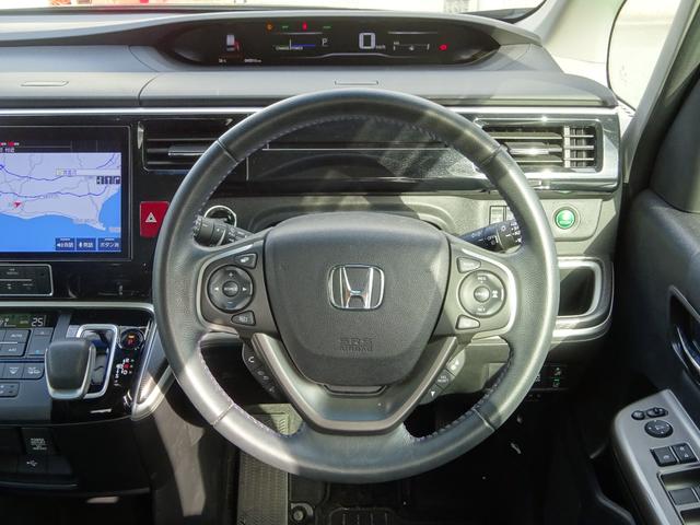 ステップワゴンスパーダ e:HEVスパーダG・EXホンダセンシング 1オーナー 禁煙車 純正メモリナビ 純正ドラレコ前後 天吊りモニター マルチビューカメラ ETC2.0 エアバック 地デジ クルコン サイドエアバッグ シ-トヒ-タ- 衝突軽減システム スマキー(30枚目)