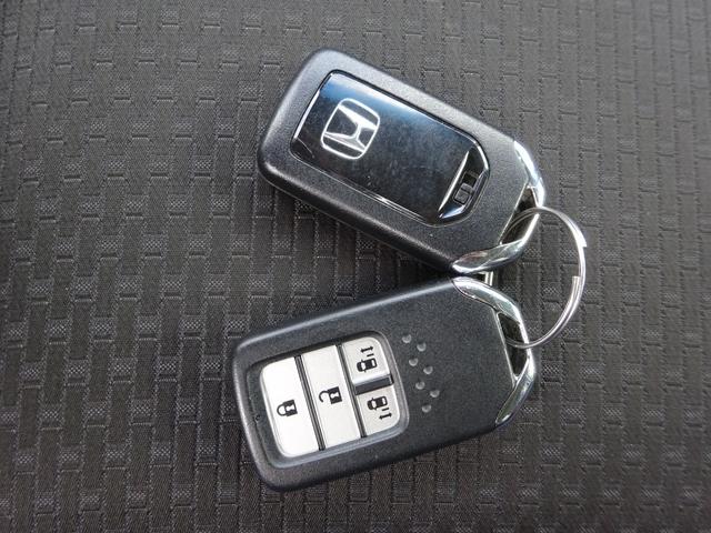 ステップワゴンスパーダ e:HEVスパーダG・EXホンダセンシング 1オーナー 禁煙車 純正メモリナビ 純正ドラレコ前後 天吊りモニター マルチビューカメラ ETC2.0 エアバック 地デジ クルコン サイドエアバッグ シ-トヒ-タ- 衝突軽減システム スマキー(58枚目)