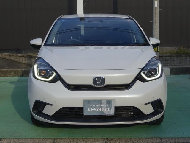 フィット ホーム 1オーナー 禁煙車 リアdeあんしん 純正メモリナビ 純正ドラレコ前後 衝突軽減ブレーキ ワンオーナー リアカメ LEDライト クリアランスソナー 記録簿付 エアバッグ iストップ スマ-トキ-(5枚目)