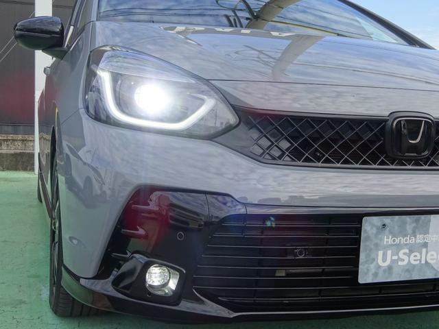 フィット e:HEVRS 1オーナー/禁煙車/無限マット・バイザー/ETC2.0 エアバッグ ナビ&TV パワーウィンドウ 助手席エアバッグ Dレコ フルセグテレビ LEDヘッドランプ セキュリティアラーム フルオートエアコン(13枚目)