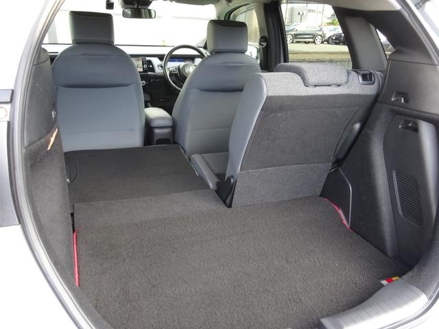 フィット e:HEVRS 1オーナー/禁煙車/無限マット・バイザー/ETC2.0 エアバッグ ナビ&TV パワーウィンドウ 助手席エアバッグ Dレコ フルセグテレビ LEDヘッドランプ セキュリティアラーム フルオートエアコン(56枚目)