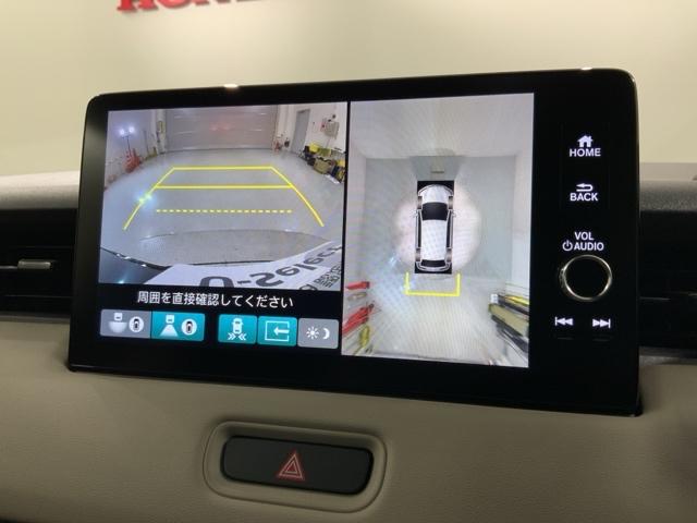 ヴェゼル e:HEVZ・PLaYパッケージ HSENSING 2ト-ン 新車保証 試乗車 オートクルーズコントロール ワンオーナー LEDヘッド USB 電動テールゲート 衝突被害軽減システム リヤカメラ フルセグテレビ 横滑り防止装置 ETC(7枚目)