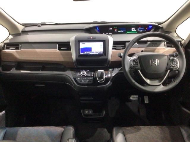 フリード+ハイブリッド ハイブリッド・クロスターホンダセンシング 最長5年保証 ワンオ-ナ- ナビ TV Rカメラ BTオ-ディオ dえ ドラレコ ETC LEDライト 両側電動ドア VSA シ-トヒ-タ- クルコン アルミ スマ-トキ- 盗難防止装置 整備記録簿(8枚目)