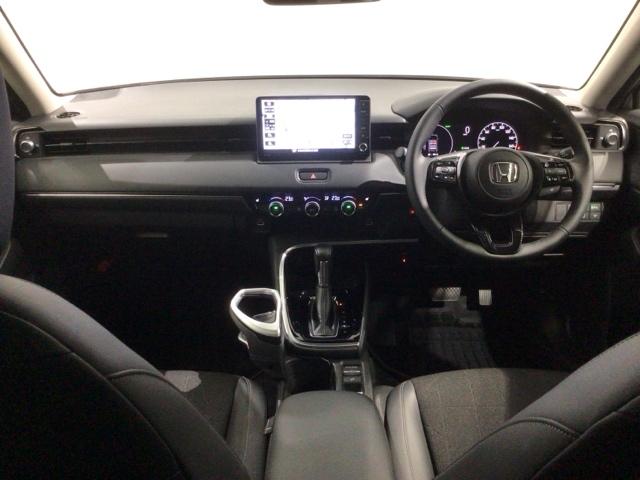 ヴェゼル ｅ：ＨＥＶＺ　Ｈ　ＳＥＮＳＩＮＧ　最長５年保証　ワンオーナー　ナビＶＸＵ－２１５ＶＺＩ　ＴＶ　Ｒカメラ　ＣＤ録音　ＢＴオ－ディオ　ＤＶＤ　ＥＴＣ　ＬＥＤライト　ＶＳＡ　シートヒーター　クルコン　Ｐテールゲート（9枚目）