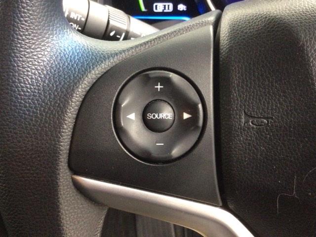 フィットハイブリッド Fパッケージ 1年保証 ワンオ-ナ- ナビVXM-155VSI TV Rカメラ BTオ-ディオ DVD ドラレコ ETC VSA スマ-トキ- スペアキ- 盗難防止装置 整備記録簿 ドアバイザ- AAC 記録簿有り(9枚目)