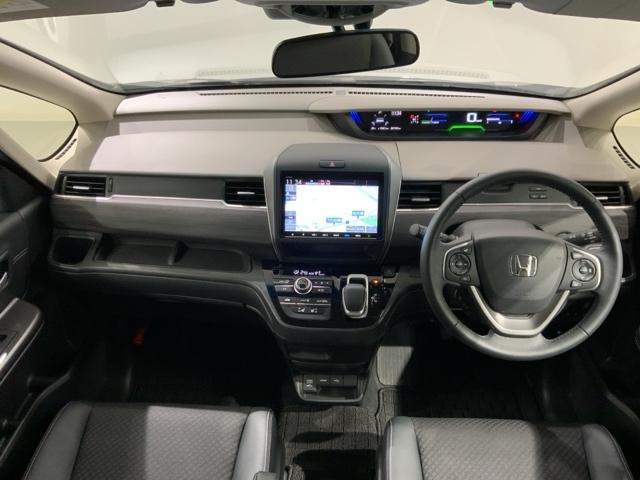 フリード＋ハイブリッド ハイブリッドＧ・ホンダセンシング　最長５年保証　ワンオーナー　ナビＶＸＭ－２０７ＶＦＮＩ　ＴＶ　Ｒカメラ　ＣＤ録音　ＢＴオ－ディオ　ＤＶＤ　ＥＴＣ　ＬＥＤライト　ＶＳＡ　両側電動ドア　シートヒーター　クルコン　アルミ　スマートキー（9枚目）