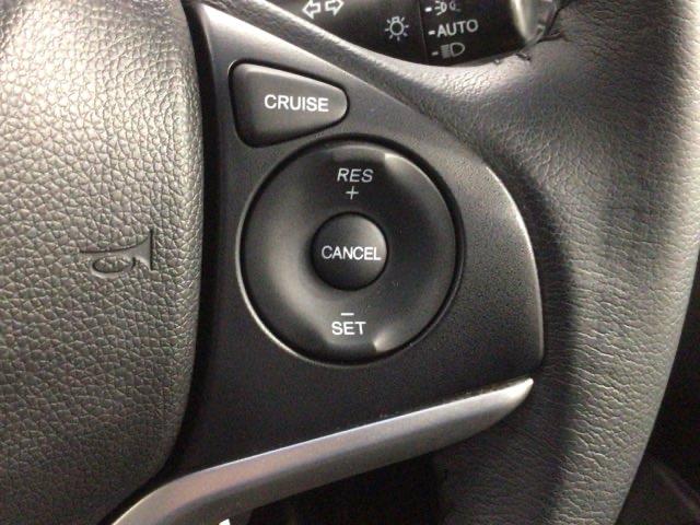 フィットハイブリッド Ｌパッケージ　あんしんＰＫＧ　１年保証　ワンオ－ナ－　ナビＶＸＭ－１４５ＶＦｉ　ＴＶ　ＣＤ録音　ＤＶＤ　ＥＴＣ　ＬＥＤライト　ＶＳＡクルコン　アルミ　スマ－トキ－　スペアキ－　盗難防止装置　整備記録簿　ドアバイザ－（9枚目）