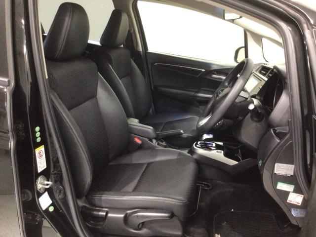 フィットハイブリッド Ｌパッケージ　あんしんＰＫＧ　１年保証　ワンオ－ナ－　ナビＶＸＭ－１４５ＶＦｉ　ＴＶ　ＣＤ録音　ＤＶＤ　ＥＴＣ　ＬＥＤライト　ＶＳＡクルコン　アルミ　スマ－トキ－　スペアキ－　盗難防止装置　整備記録簿　ドアバイザ－（18枚目）