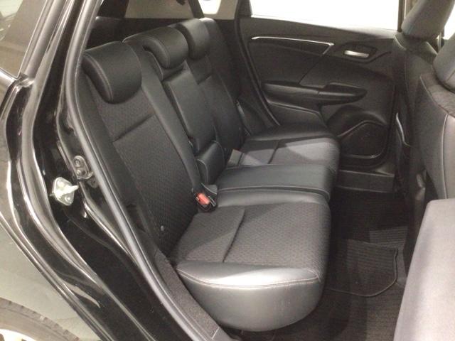 フィットハイブリッド Ｌパッケージ　あんしんＰＫＧ　１年保証　ワンオ－ナ－　ナビＶＸＭ－１４５ＶＦｉ　ＴＶ　ＣＤ録音　ＤＶＤ　ＥＴＣ　ＬＥＤライト　ＶＳＡクルコン　アルミ　スマ－トキ－　スペアキ－　盗難防止装置　整備記録簿　ドアバイザ－（19枚目）