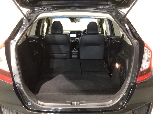 フィットハイブリッド Ｌパッケージ　あんしんＰＫＧ　１年保証　ワンオ－ナ－　ナビＶＸＭ－１４５ＶＦｉ　ＴＶ　ＣＤ録音　ＤＶＤ　ＥＴＣ　ＬＥＤライト　ＶＳＡクルコン　アルミ　スマ－トキ－　スペアキ－　盗難防止装置　整備記録簿　ドアバイザ－（20枚目）