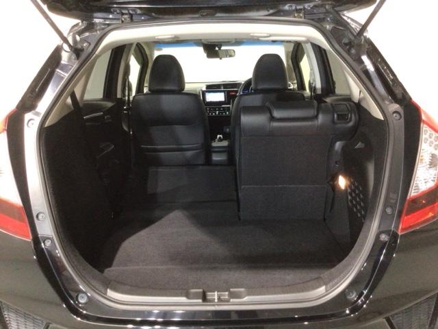 フィットハイブリッド Ｌパッケージ　あんしんＰＫＧ　１年保証　ワンオ－ナ－　ナビＶＸＭ－１４５ＶＦｉ　ＴＶ　ＣＤ録音　ＤＶＤ　ＥＴＣ　ＬＥＤライト　ＶＳＡクルコン　アルミ　スマ－トキ－　スペアキ－　盗難防止装置　整備記録簿　ドアバイザ－（34枚目）