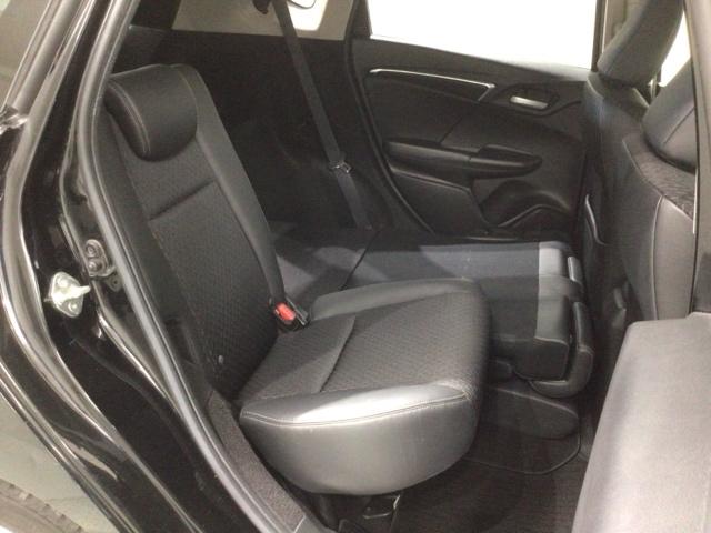 フィットハイブリッド Ｌパッケージ　あんしんＰＫＧ　１年保証　ワンオ－ナ－　ナビＶＸＭ－１４５ＶＦｉ　ＴＶ　ＣＤ録音　ＤＶＤ　ＥＴＣ　ＬＥＤライト　ＶＳＡクルコン　アルミ　スマ－トキ－　スペアキ－　盗難防止装置　整備記録簿　ドアバイザ－（35枚目）