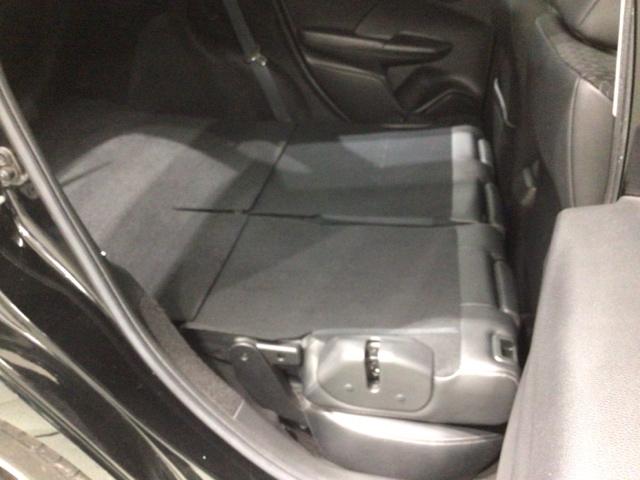 フィットハイブリッド Ｌパッケージ　あんしんＰＫＧ　１年保証　ワンオ－ナ－　ナビＶＸＭ－１４５ＶＦｉ　ＴＶ　ＣＤ録音　ＤＶＤ　ＥＴＣ　ＬＥＤライト　ＶＳＡクルコン　アルミ　スマ－トキ－　スペアキ－　盗難防止装置　整備記録簿　ドアバイザ－（36枚目）