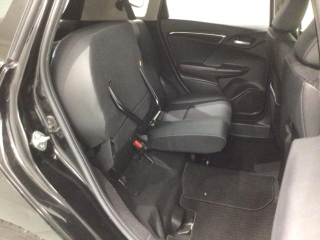 フィットハイブリッド Ｌパッケージ　あんしんＰＫＧ　１年保証　ワンオ－ナ－　ナビＶＸＭ－１４５ＶＦｉ　ＴＶ　ＣＤ録音　ＤＶＤ　ＥＴＣ　ＬＥＤライト　ＶＳＡクルコン　アルミ　スマ－トキ－　スペアキ－　盗難防止装置　整備記録簿　ドアバイザ－（38枚目）