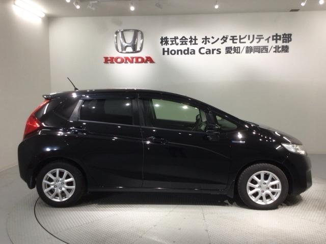 フィットハイブリッド Ｌパッケージ　あんしんＰＫＧ　１年保証　ワンオ－ナ－　ナビＶＸＭ－１４５ＶＦｉ　ＴＶ　ＣＤ録音　ＤＶＤ　ＥＴＣ　ＬＥＤライト　ＶＳＡクルコン　アルミ　スマ－トキ－　スペアキ－　盗難防止装置　整備記録簿　ドアバイザ－（51枚目）