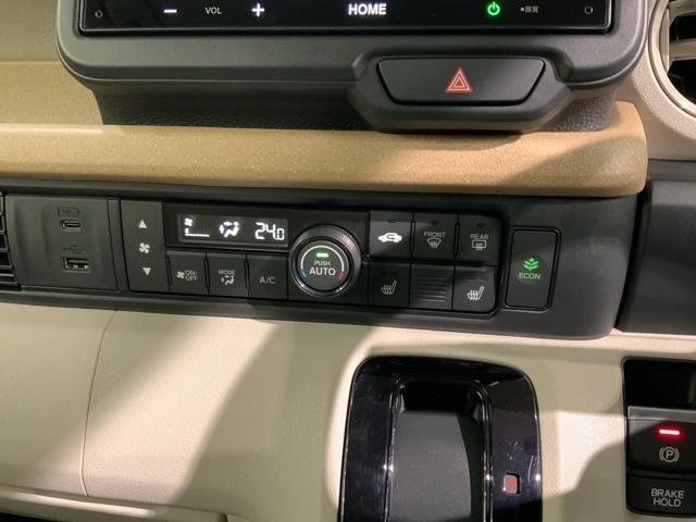 Ｎ－ＢＯＸ ファッションスタイル　Ｈ　ＳＥＮＳＩＮＧ　２ト－ン　新車保証　ワンオ－ナ－　Ｒカメラ　ＢＴオ－ディオ　シ－トヒ－タ－　ＥＴＣ　ＬＥＤライト　ＶＳＡ　クルコン　スマ－トキ－　盗難防止装置　整備記録簿　ＡＡＣ　スペアキ－（11枚目）