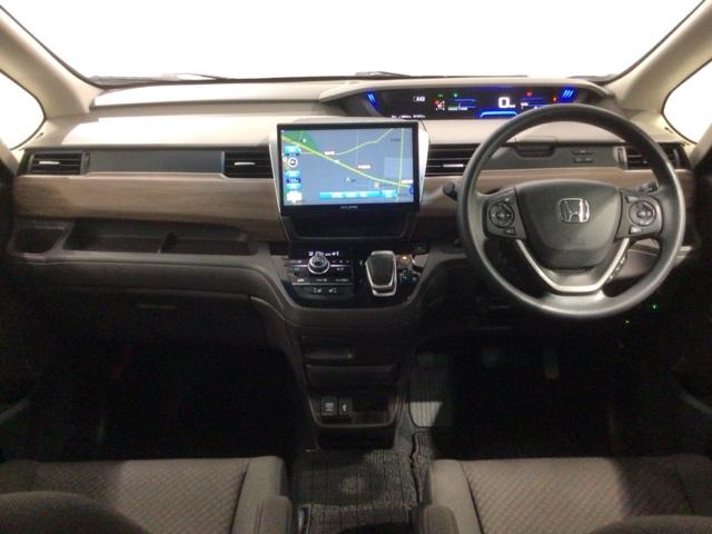 フリードハイブリッド ハイブリッド・Ｇ　Ｈ　ＳＥＮＳＩＮＧ　最長５年保証　ワンオ－ナ－　ナビ　ＴＶ　Ｒカメラ　ＢＴオ－ディオ　ＤＶＤ　ドラレコ　ＥＴＣ　ＬＥＤライト　両側電動ドア　ＶＳＡ　シ－トヒ－タ－　クルコン　スマ－トキ－　盗難防止装置（9枚目）