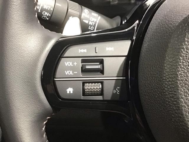 Ｎ－ＢＯＸカスタム ターボ　Ｈ　ＳＥＮＳＩＮＧ　新車保証　試乗車　ワンオ－ナ－　ナビＬＸＵ－２４２ＮＢｉ　ＴＶ　Ｒカメラ　ＣＤ録音　ＢＴオ－ディオ　ＤＶＤ　シ－トヒ－タ－ＥＴＣ　ＬＥＤライト　両側電動ドア　ＶＳＡ　クルコンＡＡＣ（10枚目）