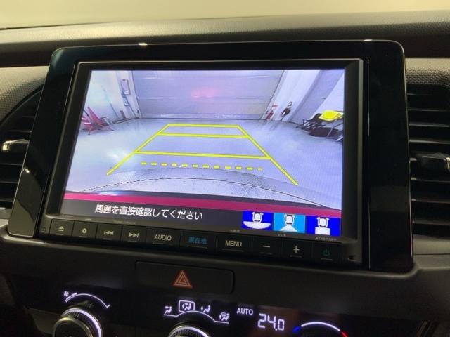 フィット ｅ：ＨＥＶクロスター　Ｈ　ＳＥＮＳＩＮＧ　最長５年保証　ワンオ－ナ－　ナビＶＸＭ－２１５ＶＦＥＩ　ＴＶ　Ｒカメラ　ＢＴオ－ディオ　ＤＶＤ　ＥＴＣ　ＬＥＤライト　ＶＳＡ　クルコン　アルミ　スマ－トキ－　スペアキ－盗難防止装置（6枚目）
