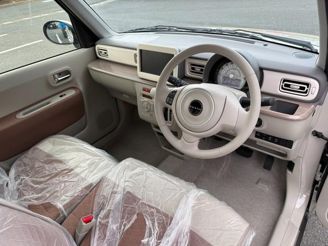 アルトラパン Ｘ　届出済未使用車　純正アルミ　スマートキー×２　新車保証書　取扱説明書　アイドリングストップ　電動格納ミラー　禁煙車　ＬＥＤヘッドライト　シートヒーター（6枚目）