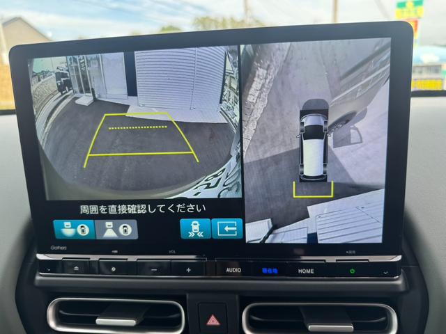 フリード ｅ：ＨＥＶクロスター　デザートベージュ　４ＷＤ　６人乗り　１１．４インチナビＴＶ　マルチビューカメラ　ドライブレコーダー３カメラ　ＥＴＣ２．０　両側パワースライドドア（15枚目）