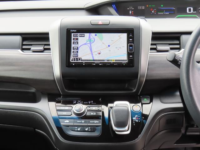 フリードハイブリッド ハイブリッド・Ｇブラックスタイル　ワンオーナー車　純正メモリーナビ　フルセグテレビ　バックカメラ　シートヒーター　ＥＴＣ車載器　ホンダセンシング　Ｗ電動ドア　衝突軽減ブレーキ　オートクルーズコントロール　ドライブレコーダー　Ｒカメラ（17枚目）