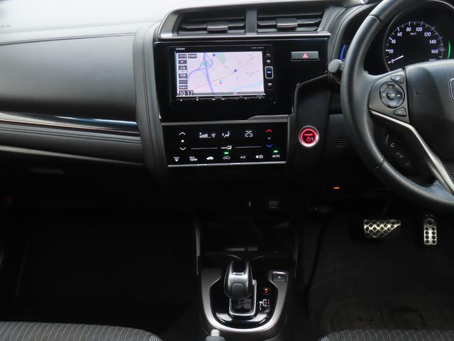 フィットハイブリッド Ｓホンダセンシング　ワンオーナー車　純正メモリーナビ　フルセグテレビ　バックカメラ　ＥＴＣ車載器　ホンダセンシング　スマ－トキ－　ナビＴＶ　アクティブクルーズコントロール　パワーウインドウ　ドライブレコーダ　ＤＶＤ再生（19枚目）
